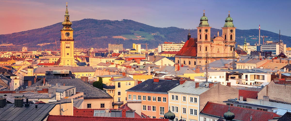 A view over the rooftops of Linz at sunset in Austria